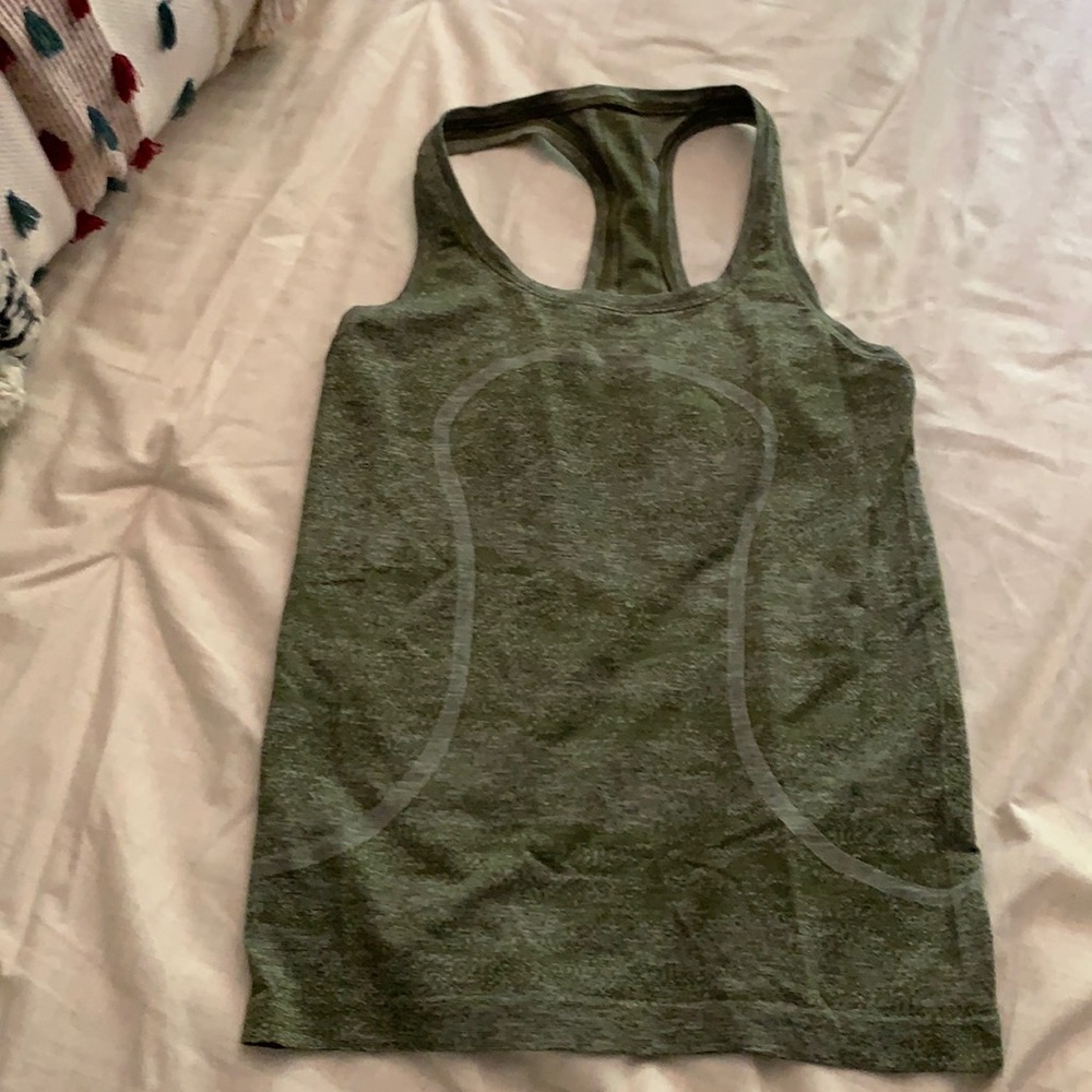 Lululemon workout top. Color is green.